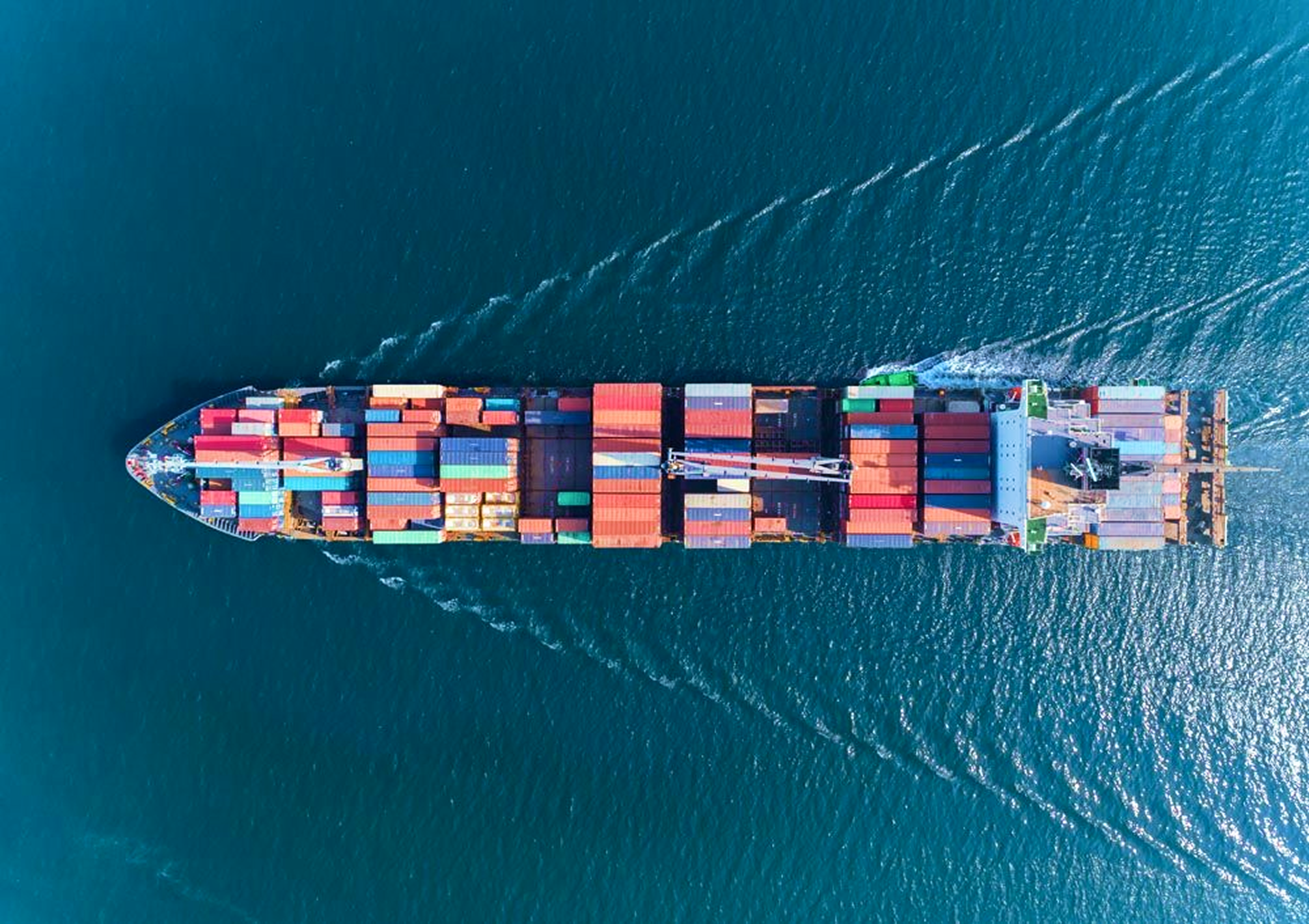 Aerial view of cargo container ship representing global commerce and international trade